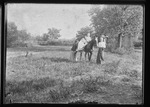 [Kansas] Photograph of women, and children sitting on top of a horse by Edington Studio