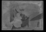 [Kansas] Photograph of woman holding a baby