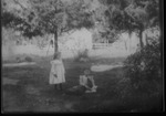 [Kansas] Photograph of two children with a dog