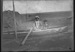 [Kansas] Photograph of a woman and child in a canoe