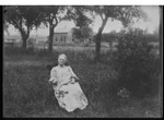 [Kansas] Photograph of older woman sitting on chair