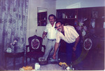 [People] Photograph of Serbando Noyala and Jesus Chapa celebrating a birthday