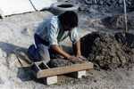 [Reynosa, CAV-Arriaga] Photograph of Brick Molder Packing Clay into a Mold by Scott Cook