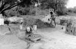 [Reynosa, CAV-Arriaga] Photograph of Two Brick Workers Performing Different Stages of Production by Scott Cook