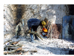 [Reynosa, CAV-Arriaga] Photograph of Jose Luis Martinez Feeding Wood into a Kiln Firebox by Scott Cook