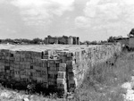 [Reynosa, CEB] Photograph of Unsold Bricks with an Abandoned Kiln in the Background by Scott Cook
