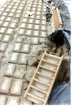 [Reynosa, CAV-Arriaga] Photograph of Damaged Bricks and a Brick Mold with Metal Frogs by Scott Cook
