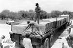 [Reynosa, CAV-Arriaga] Photograph of Toño Reynoso and Tiburcio Ramírez During Brick Loading Operations by Scott Cook