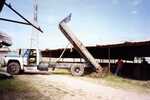 [Reynosa, CRG] Photograph of Photograph of Dumping Clay at a Molding Station by Scott Cook