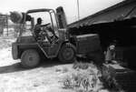 [Reynosa, CRG] Photograph of a Forklift Transporting Semi-Dried Green Bricks by Scott Cook