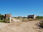 [Reynosa, ELL-New] Photograph of the Front Gate of New Ladrillera Reynoso on the Camino Real by Scott Cook