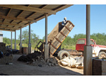 [Reynosa, ELL-New] Photograph of Dumping Processed Clay at a Molding Station by Scott Cook