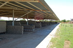 [Reynosa, ELL-New] Photograph of a Brick Molding and Drying Shed with Ten Workstations by Scott Cook