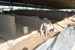 [Reynosa, ELL-New] Photograph of Manuel Pasilla Rewetting and Remixing Clay by Scott Cook