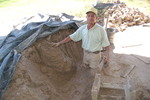[Reynosa, ELL-New] Photograph of Juan Garza Remixing Wet Clay Prior to Molding by Scott Cook