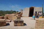 [Reynosa, ELL-New] Photograph of a Kiln Being Loaded with Bricks for Firing by Scott Cook