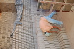 [Reynosa, ELL-New] Photograph of a Kiln Setter at Work by Scott Cook
