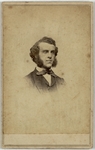 Man with mutton chops, half length, facing right, front by J.D. Fowler & Co.