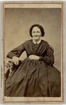 Portrait of an older woman seated, three-quarter length, facing forward, front by Bostwick & Buttles