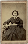 Portrait of an old woman seated, three-quarter length, facing forward, front by Bostwick & Buttles