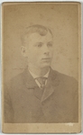 Young man in suit and tie, half length, facing right, front
