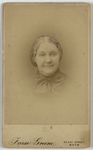 Portrait of a woman with hair pulled back and large neck bow, front by Friese Greene