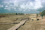 Photograph of 12th Evac. Medical wards and latrine by Cayetano E. Barrera