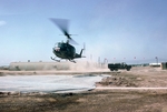 Photograph of dust off chopper landing with casualties by Cayetano E. Barrera