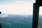 Photograph of air strike from helicopter on way to Vung Tau by Cayetano E. Barrera