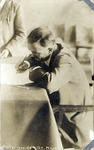 Photograph of former President of Mexico, Francisco I. Madero, signing a document days before assassination