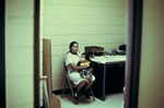 Woman and a child inside medical room