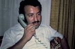 Curandero on the phone