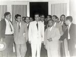 Photograph of Doctor Norberto Trevino Zapata (white suit), Secundaria Juan Jose de la Garza, Matamoros, Tamaulipas