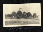 Page 42, View of a front yard and dirt road