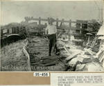 Page 48, Deputy sheriff Peavey standing in Olmito train derailment of 1915 by John R. Peavey
