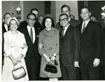 Photograph of Kika de la Garza with various dignitaries at a Democratic National Congressional Committee meeting