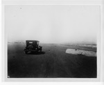 [South Padre Island] Photograph of automobile on the Ocean Beach Driveway