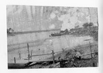 [Brownsville] Photograph of ferry and steamboat landing area on Rio Grande river