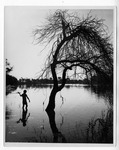 [Brownsville] Photograph of a young boy fishing in resaca