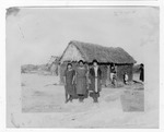 [Homesteads] Photograph of Mexican women in front of jacales