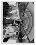 [Airport] Photograph of passengers on board Pan American Airways plane cabin