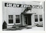 [Edinburg] Photograph of front view of Golden Jersey Creamery Building