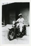 [Edinburg] Photograph of Worker on Motorcycle