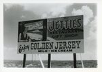 [South Padre Island] Photograph of Golden Jersey Billboard/The Jetties Restaurant