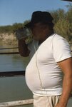 [Los Ebanos] Photograph of Man Drinking Glass of Water