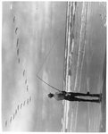 [South Padre Island] Photograph of Man Fishing