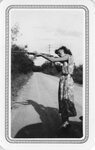 [Unidentified] Photograph of Woman Holding a Firearm