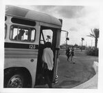 [Education] Photograph of Individuals Getting on Bus