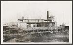 [South Padre Island] Photograph of Wood burning steamer, Santiago in South Padre Island