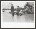 [Military] Photograph of Two Soldiers in a Flooded Camp